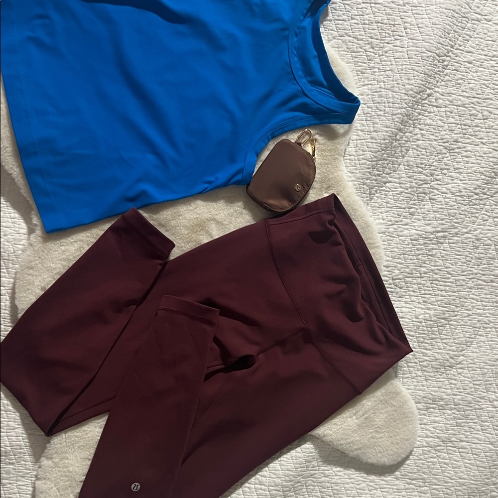lululemon Burgundy leggings and blue lululemon top and key chain